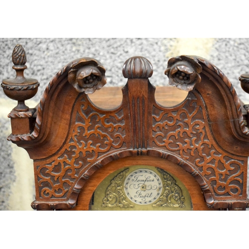 841 - A SMALLER GEORGE III STYLE MAHOGANY GRANDMOTHER CLOCK with scrolling arched pediment. 120 cm x 22 cm... 