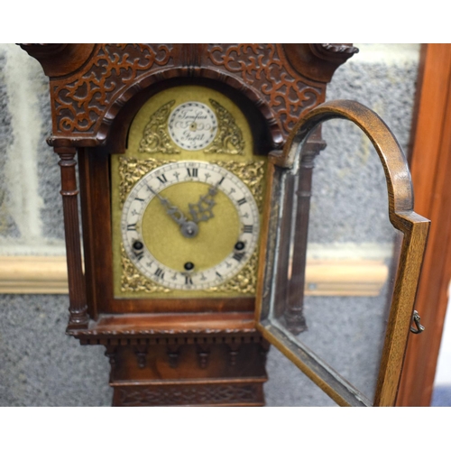 841 - A SMALLER GEORGE III STYLE MAHOGANY GRANDMOTHER CLOCK with scrolling arched pediment. 120 cm x 22 cm... 