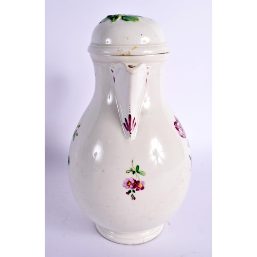 85 - AN 18TH CENTURY VIENNA PORCELAIN COFFEE POT AND COVER painted with flowers. 21 cm x 12 cm.