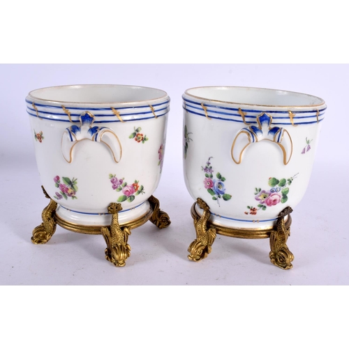 90 - A PAIR OF 19TH CENTURY SEVRES PORCELAIN CACHE POT upon gilt bronze mounts. 13 cm x 15 cm.