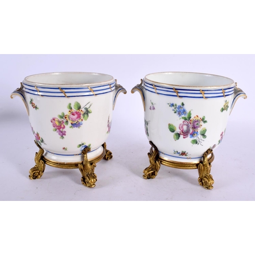 90 - A PAIR OF 19TH CENTURY SEVRES PORCELAIN CACHE POT upon gilt bronze mounts. 13 cm x 15 cm.