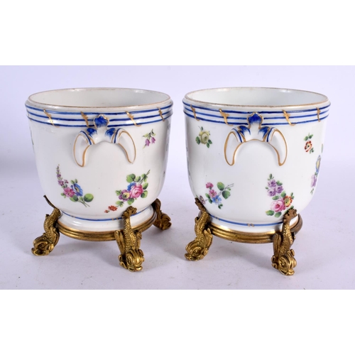 90 - A PAIR OF 19TH CENTURY SEVRES PORCELAIN CACHE POT upon gilt bronze mounts. 13 cm x 15 cm.