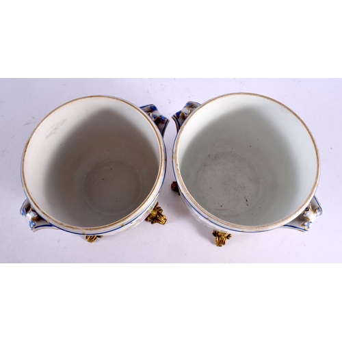 90 - A PAIR OF 19TH CENTURY SEVRES PORCELAIN CACHE POT upon gilt bronze mounts. 13 cm x 15 cm.