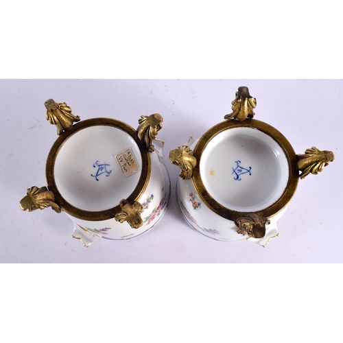 90 - A PAIR OF 19TH CENTURY SEVRES PORCELAIN CACHE POT upon gilt bronze mounts. 13 cm x 15 cm.