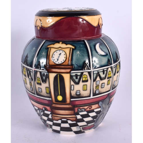 92 - A LIMITED EDITION MOORCROFT CLOCK GINGER JAR AND COVER. 18 cm x 9 cm.