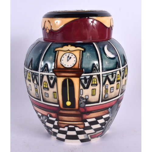 92 - A LIMITED EDITION MOORCROFT CLOCK GINGER JAR AND COVER. 18 cm x 9 cm.