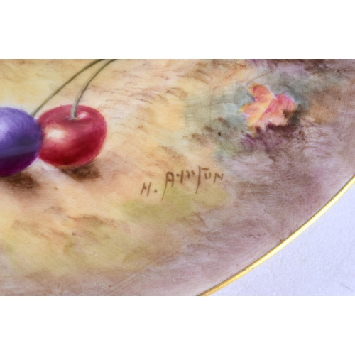 93 - A ROYAL WORCESTER CABINET PLATE painted with fruit by H Ayrton. 25 cm diameter.