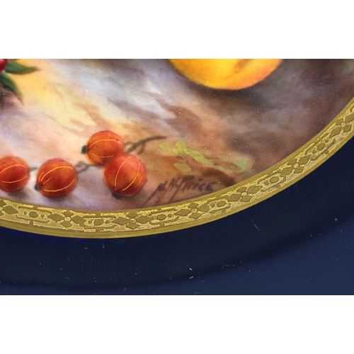 94 - A ROYAL WORCESTER BLUE GROUND CABINET PLATE painted with fruit by Price. 23 cm diameter.