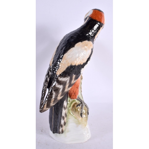 102 - A LARGE KPM BERLIN PORCELAIN FIGURE OF A BIRD. 25 cm high.