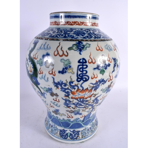 109 - A LARGE 19TH CENTURY CHINESE FAMILLE VERTE BLUE AND WHITE BALUSTER VASE bearing Qianlong marks to ba... 