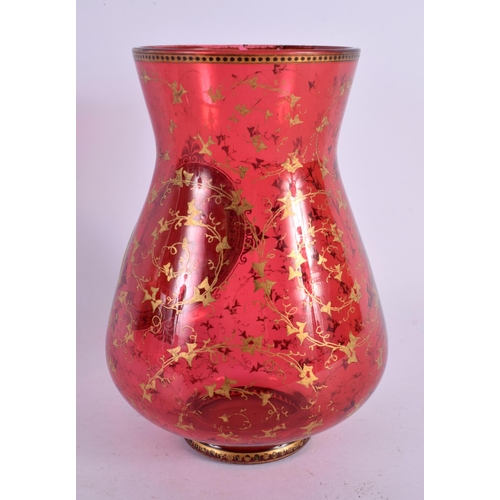 115 - A 19TH CENTURY BOHEMIAN CRANBERRY GLASS VASE painted with a portrait of a female. 15 cm high.