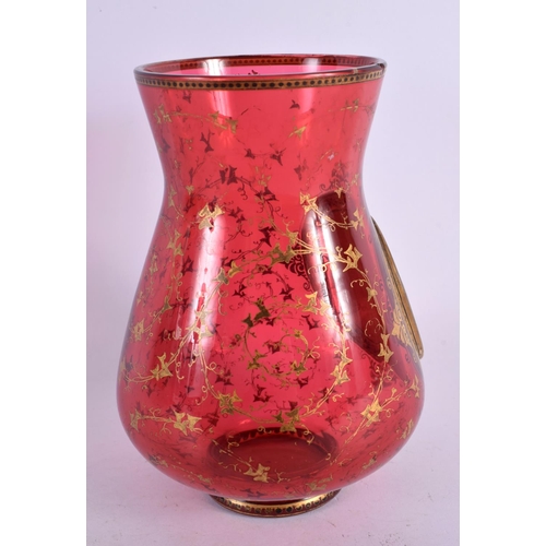 115 - A 19TH CENTURY BOHEMIAN CRANBERRY GLASS VASE painted with a portrait of a female. 15 cm high.