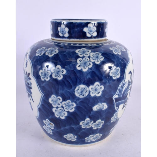 119 - A 19TH CENTURY CHINESE BLUE AND WHITE PORCELAIN GINGER JAR AND COVER Kangxi style. 20 cm x 14 cm.