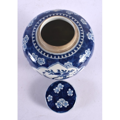 119 - A 19TH CENTURY CHINESE BLUE AND WHITE PORCELAIN GINGER JAR AND COVER Kangxi style. 20 cm x 14 cm.