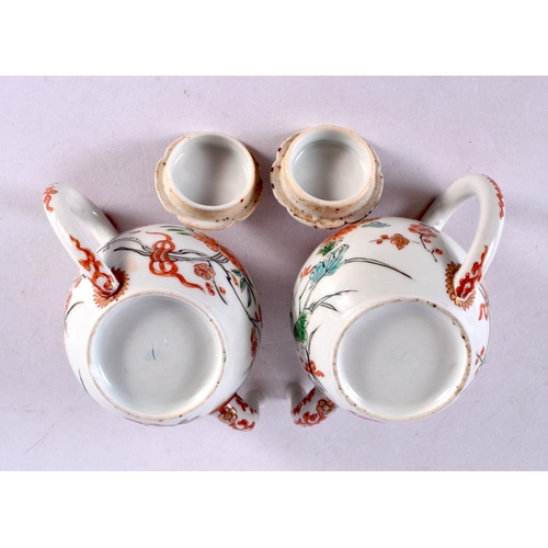 120 - A LOVELY PAIR OF 17TH CENTURY CHINESE KAKIEMON PORCELAIN TEAPOTS AND COVERS Kangxi, painted with flo... 