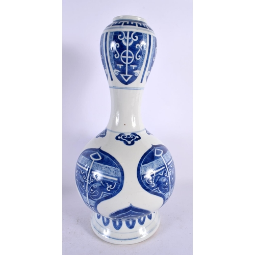 123 - A LARGE 19TH CENTURY CHINESE BLUE AND WHITE GARLIC NECK VASE bearing Kangxi marks to base, painted w... 