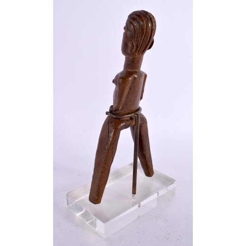 124 - A RARE AFRICAN TRIBAL CARVED WOOD SLINGSHOT formed as a figure. 20 cm x 8 cm.