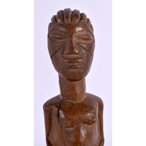 124 - A RARE AFRICAN TRIBAL CARVED WOOD SLINGSHOT formed as a figure. 20 cm x 8 cm.