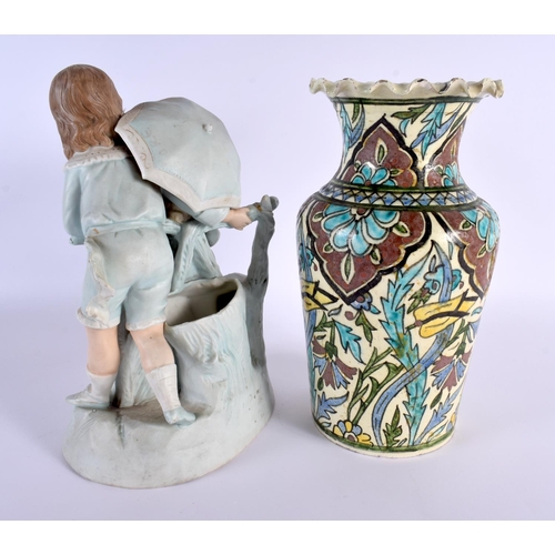 14 - AN ANTIQUE BISQUE PORCELAIN FIGURE together with a Middle Eastern vase. Largest 27 cm x 15 cm. (2)