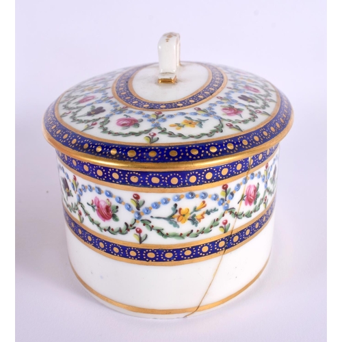 145 - Sevres butter box and cover elaborately painted with flowers surrounded by chains of blue pearls and... 