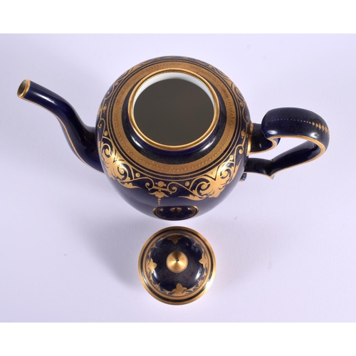 146 - Sevres teapot and cover with gilded decoration on a cobalt blue ground, marked S70 in green, Dore a ... 