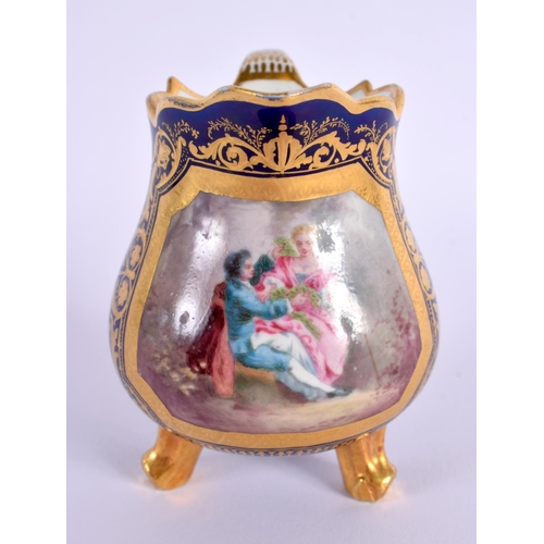 148 - Sevres three footed cream jug painted with a watteauesque type scene, small interlaced Ls mark to f... 