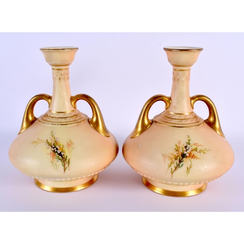 160 - Royal Worcester pair of two handled vases painted with heathers on a blush ivory ground date code fo... 