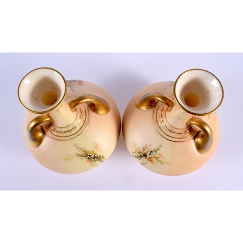 160 - Royal Worcester pair of two handled vases painted with heathers on a blush ivory ground date code fo... 