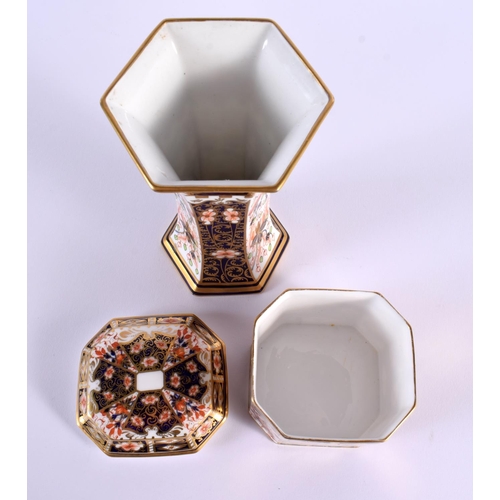 164 - Royal Crown Derby box and cover and a Royal Crown Derby hexagonal vase.  Box 9cm high, vase 16.5 cm ... 