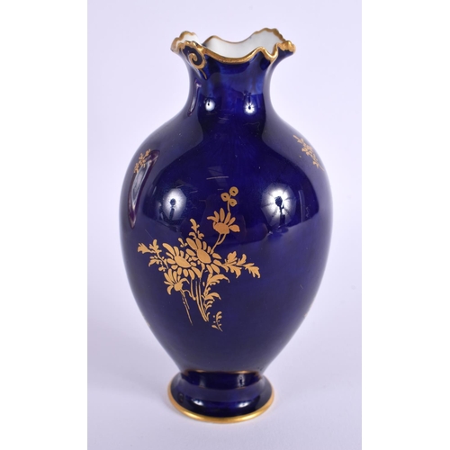 166 - Royal Crown Derby vase painted with flowers in gilt panel on a cobalt blue ground, date mark for 190... 