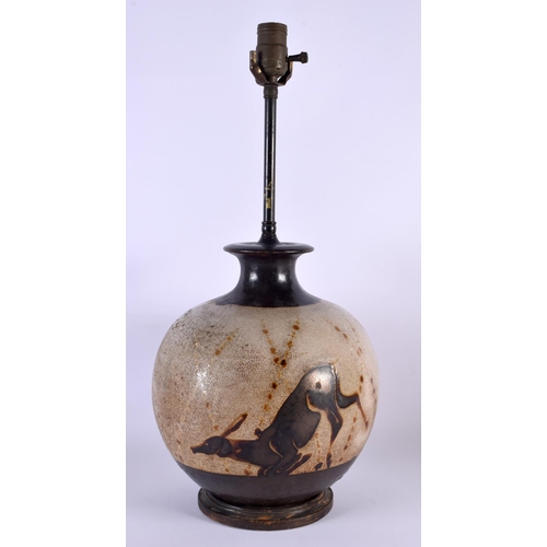 17 - A LARGE STUDIO POTTERY STONEWARE LAMP painted with deer in landscapes. 50 cm x 30 cm.