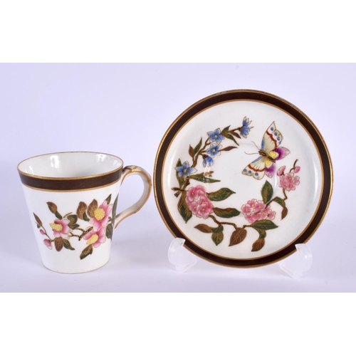 199 - Royal Worcester conical cup and saucer painted in Japanese style with butterfies and prunus blossom ... 