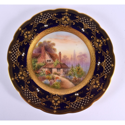 200 - Royal Worcester plate painted with an English country cottage and garden by Raymond Rushton, signed,... 