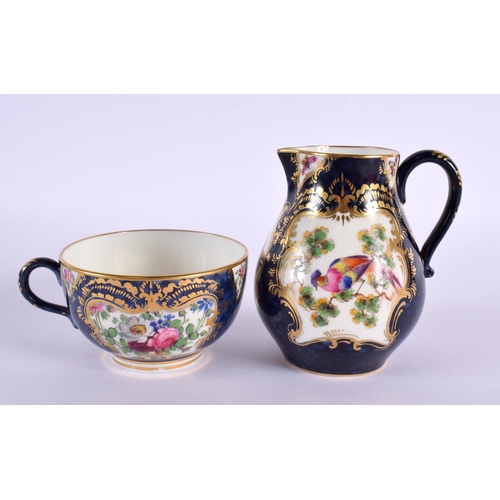 208 - Royal Worcester teacup and saucer and matching cream jug painted with exotic birds in gilt panel on ... 