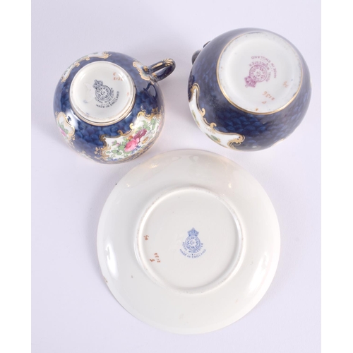 208 - Royal Worcester teacup and saucer and matching cream jug painted with exotic birds in gilt panel on ... 