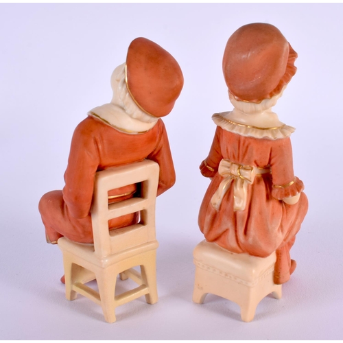 222 - 19th century Royal Worcester pair of figures of two children seated on a chair, decorated with dry b... 