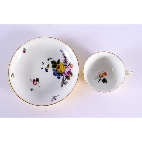 259 - 18th century Meissen yellow ground teacup and saucer painted with flower, the teacup with shaped pan... 