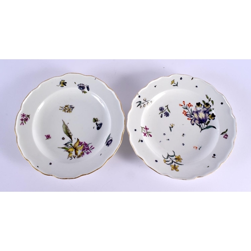 262 - 18th century pair of Meissen plates painted with a large bouquet and scattered flowers, crossed swor... 