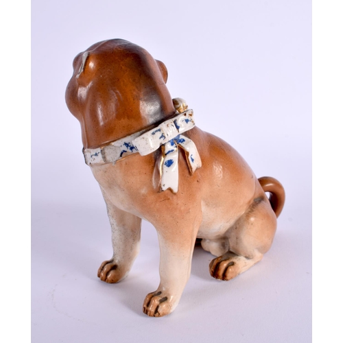 28 - A 19TH CENTURY GERMAN PORCELAIN FIGURE OF A SEATED DOG. 14 cm x 12 cm.