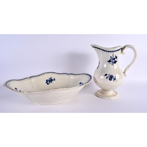 293 - 18th century pearlware jug and basin well moulded and painted in underglaze blue with flowers and a ... 