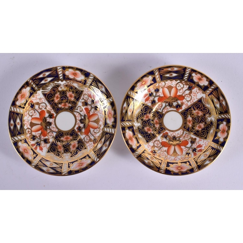 294 - Royal Crown Derby pair of unusually shaped demi-tasse coffee cup and saucer together with a similar ... 