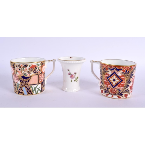 297 - Royal Crown Derby: two imari pattern coffee cans and saucers together with seven floral dishers.  Cu... 