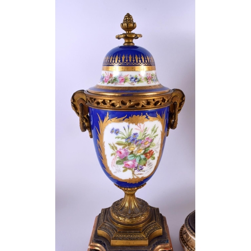 300 - A LARGE 19TH CENTURY FRENCH SEVRES PORCELAIN ORMOLU CLOCK GARNITURE painted with figures and flowers... 