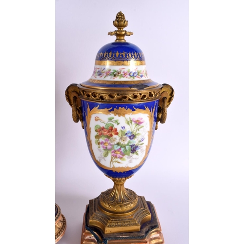 300 - A LARGE 19TH CENTURY FRENCH SEVRES PORCELAIN ORMOLU CLOCK GARNITURE painted with figures and flowers... 