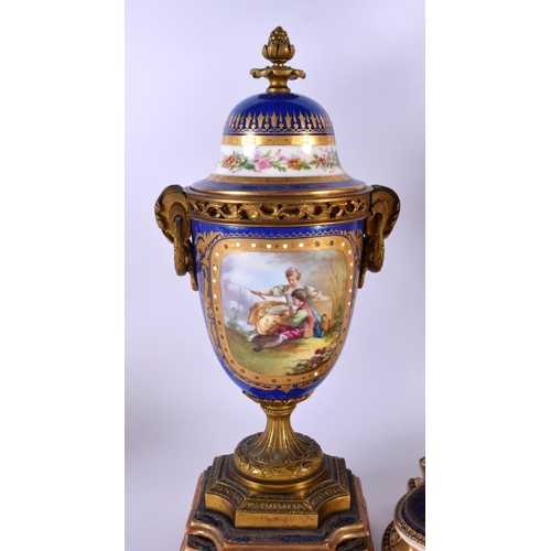 300 - A LARGE 19TH CENTURY FRENCH SEVRES PORCELAIN ORMOLU CLOCK GARNITURE painted with figures and flowers... 