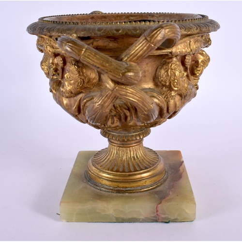 308 - A 19TH CENTURY EUROPEAN GRAND TOUR GILT BRONZE WARWICK VASE decorated with mask heads. 18 cm x 15 cm... 