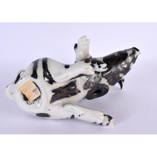 31 - AN UNUSUAL DANISH COPENHAGEN PORCELAIN FIGURE OF A PIG. 21 cm x 16 cm.