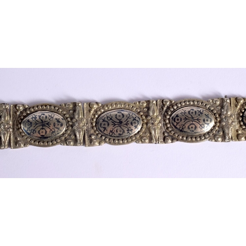 312 - A TURKISH ARMENIAN RUSSIAN NIELLO SILVER BELT decorated with foliage. 398 grams. 77 cm long.