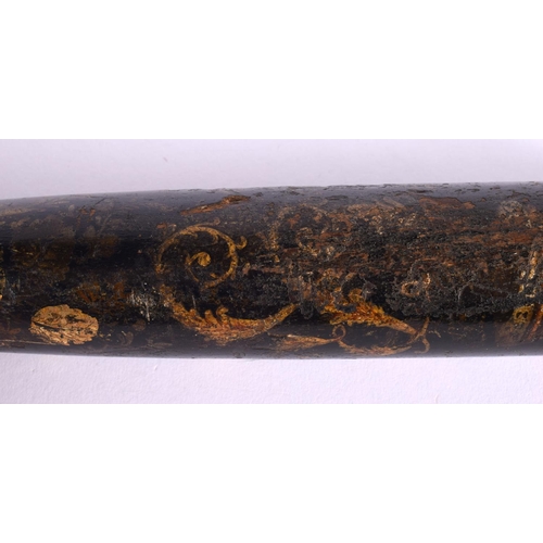 314 - AN ANTIQUE TRUNCHEON painted with flowers and motifs. 42 cm long.