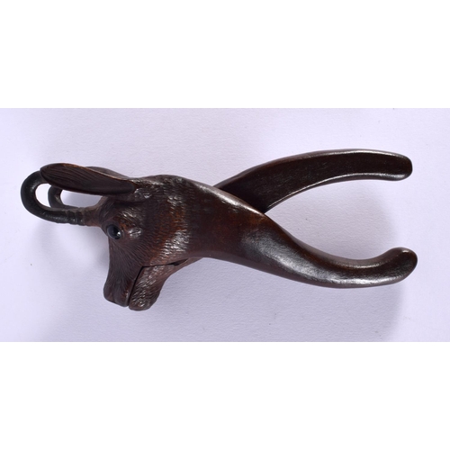 323 - A PAIR OF ANTIQUE BAVARIAN BLACK FOREST CARVED WOOD NUT CRACKERS formed as a deer. 15 cm long.